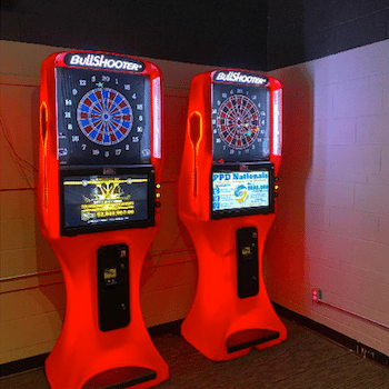 Two Bright Red Arcade Style Dart Machines.